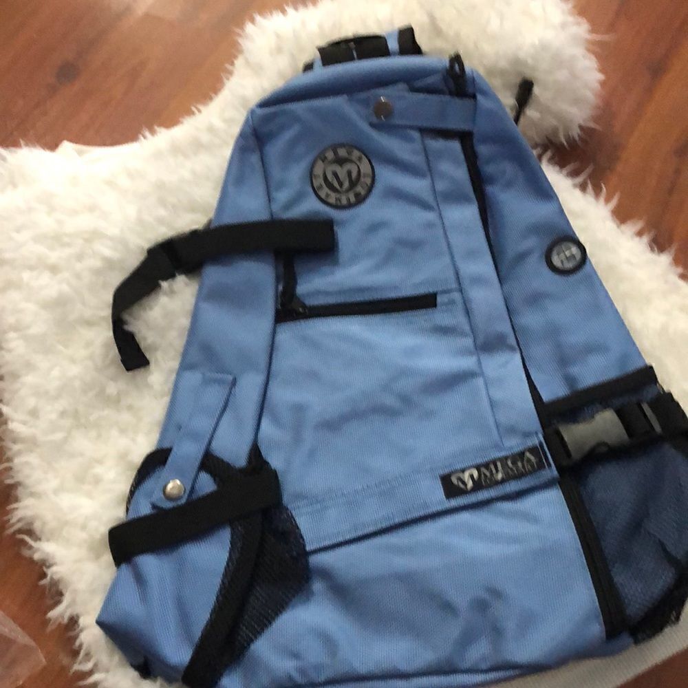 NWT sling backpack blue Megalovem…